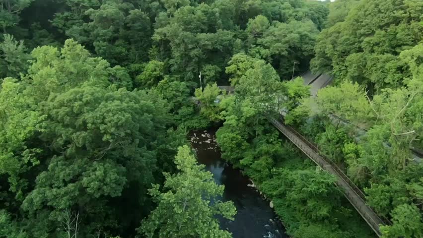 Aerial View of Wissahickon Creek During a Very Green Evening in Wissahickon Valley Park, Part of Fairmount Park System, Philadelphia Pennsylvania