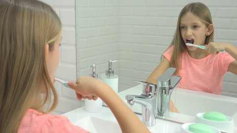 Child Brushing Baby Teeth Bathroom Girl Stock Footage Video (100%