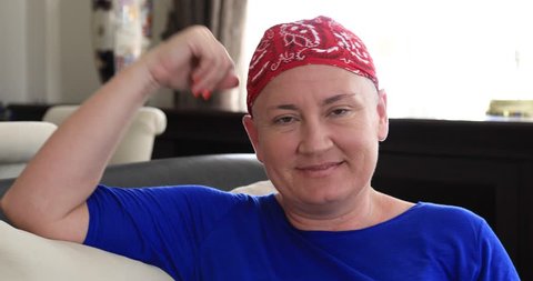 Portrait of a smiling woman with cancer