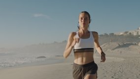 young active woman athlete running on beach enjoying exercise fitness workout female runner jogging in sunny seaside background wearing fitness tracker - Powered by Shutterstock - Get 15% off with code: PIKWIZARD15