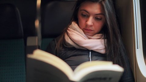 Girl Reading Book While Riding Train Stock Footage Video (100% Royalty ...