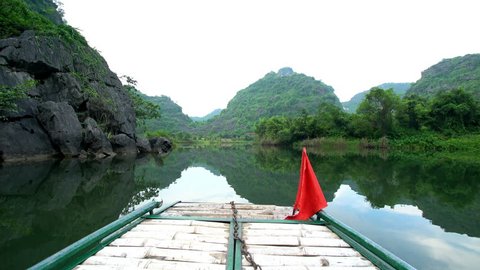 POV - Boat Navigates Landscape of Trang An Cave Network - Ninh Binh -Vietnam