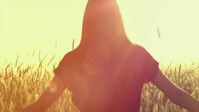 Beauty girl running on yellow wheat field over sunset sky. Freedom concept. Happy woman outdoors. Harvest. Wheat field in sunset. Slow motion 240 fps. Slowmo. 4K UHD video