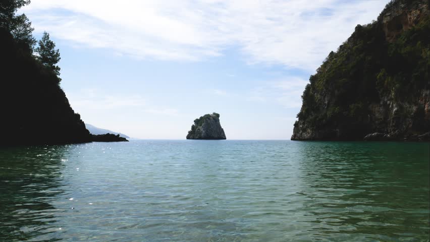 Rabbit rock (isola del Coniglio) and Baia del Buondormire on Cape Palinuro.  Palinuro, Cilento National Park, Italy