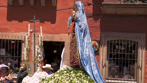 SAN MIGUEL DE ALLENDE, MEXICO - CIRCA MARCH 2016 - Virgin Mary statue on a parade float during Semana Santa Easter Holy week celebration