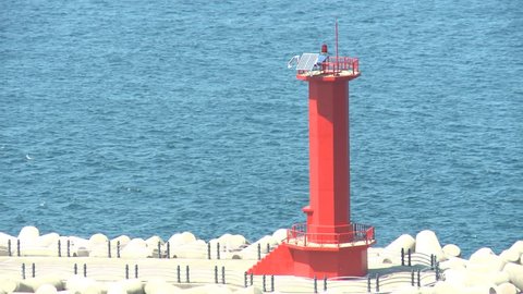 Red lighthouse on Jeju Island, South Korea