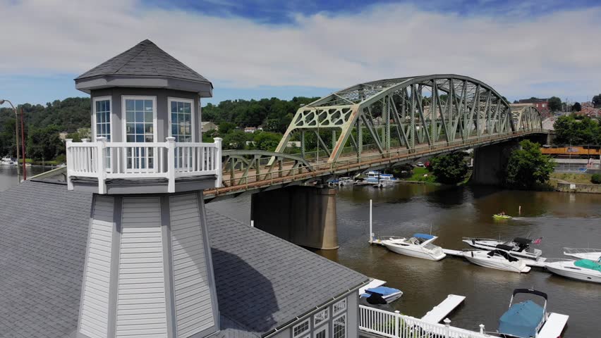 A slow forward rising aerial view of a small American town