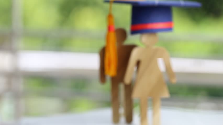 Back to School Concept, People Sign wood with Graduation celebrating cap on open textbook show alternative studying. Graduate or Education knowledge learning study abroad international Ideas. Royalty-Free Stock Footage #1013005040