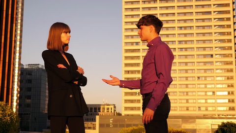 young business woman rejects man handshake, mid shot
