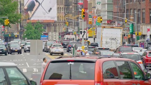 New York, United States, June 10, 2018: traffic exiting the Manhatten bridge into Chinatown in Downtown New York city