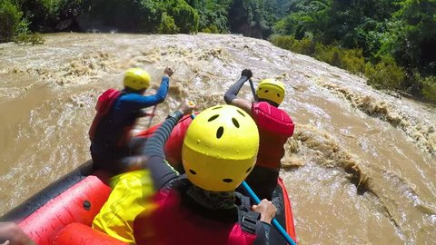 Group of adult men's screaming and yelling while whitewater rafting, boater creek ,kayaking in Pai river, Mae hong son province, Thailand.	
