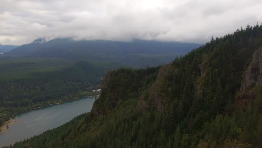 Clouds Cover Mountain. Aerial Landscape Shot
