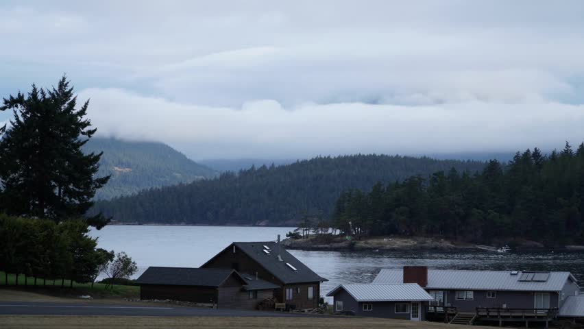 Stormy Clouds Covers The Mountain. Timelapse Shot
