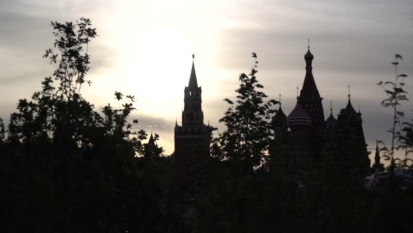 Time-lapse. Saint Basil Cathedral on Red Square at night with Kremlin Tower, Moscow. One of the most popular landmark in Russia.