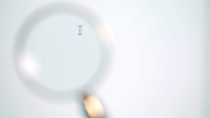 Once upon a time, there was being typed on a white screen in black laters. A magnifying glass moving left to right. Locked down real time medium shot