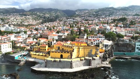 Aerial view of Sao Tiago Fort and the amphitheater-shaped city of Funchal, capital of Portugal's Autonomous Region of Madeira