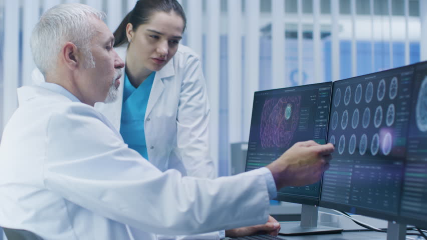 Two Medical Scientists Discussing Ct Stock Footage Video (100%  Royalty-free) 1013082023 | Shutterstock