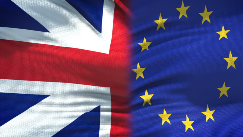 Great Britain and EU handshake international friendship summit, flag background