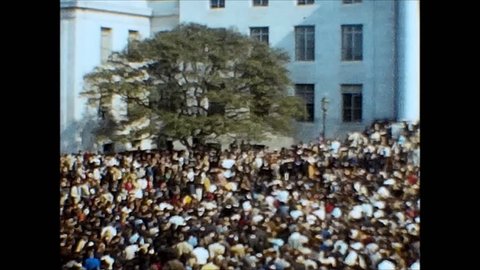 BERKELEY, CALIFORNIA/USA - CIRCA 1968: University of California, Berkeley campus with scenes of students and teachers gathering outside. Part 3 of 4.