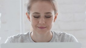 Online Video Chat by Young Woman at Work, Close Up