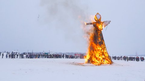 Pancake week - pagan Slavic holiday with the burning of stuffed winter. Maslenitsa in Russia, Kaluga.