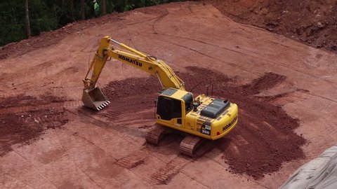 Phitsanulok, THAILAND – June 30, 2018 Yellow excavator working on construction site