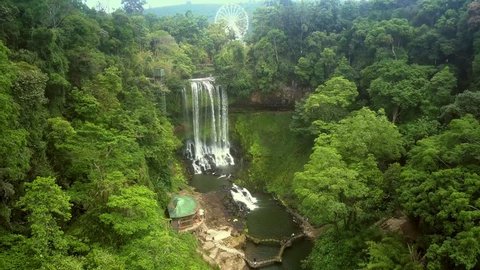 inspiring high upper panorama endless tropical jungle around mountain river gorge with waterfall
