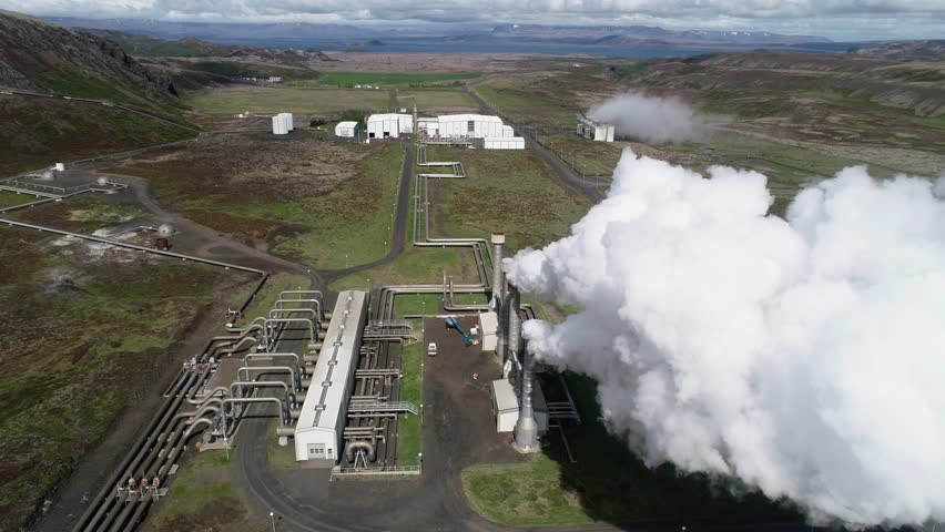 Aerial footage of a clean energy power plant in Iceland producing heat and electricity with geothermal power