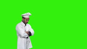 Confused chef walking goes and back thinking what to cook today, raising a finger with happy face emotion got an idea, on green Chroma.