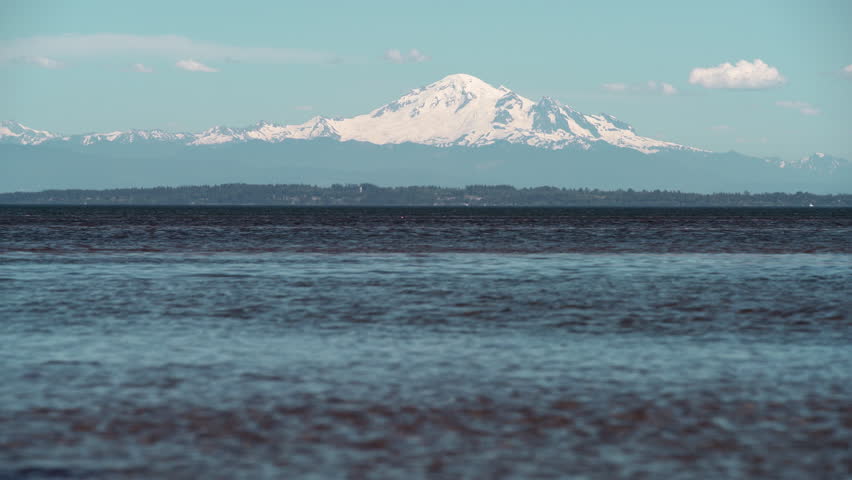 Mount Baker, Washington State. 4K UHD. Mount Baker rising up behind Boundary Bay seen from Point Roberts. 4K UHD.
