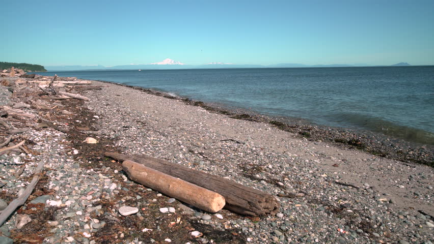 Point Roberts Shore. 4K UHD. The beach in Point Roberts, Washington State, looking out across Georgia Strait. USA. 4K. UHD.
