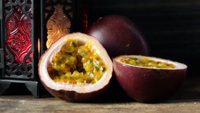 Passion fruits over wooden background
