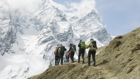 A lot of backpackers on the trekking Larke Pass in Nepal. Manaslu area.