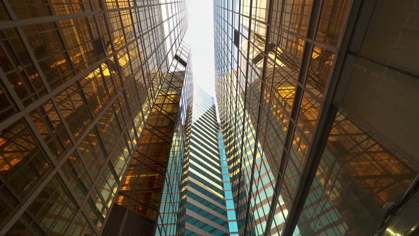 Low angle view of commercial buildings in central business district. Business company office futuristic buildings. Modern architecture. Financial economy growth concept. | Shutterstock HD Video #1013198234