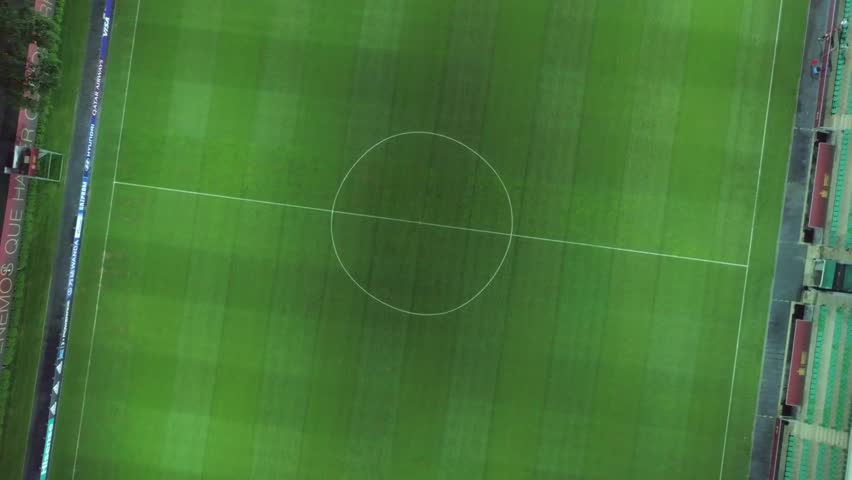 Aerial shooting: Empty soccer field from the top at night Royalty-Free Stock Footage #1013198942