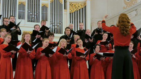 NIZHNY NOVGOROD, RUSSIA - JUNE 2018 - Conservatory - Group of people singing in choir. Classical music, culture, art and leisure time concept