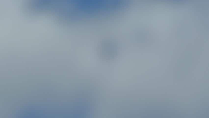 A military plane is flying in the sky.