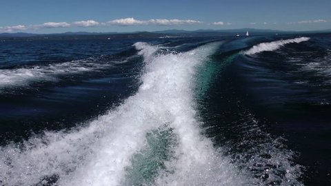 Fast power boat wake at speed, Lake Taupo, North Island, New Zealand