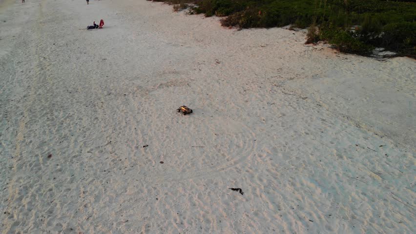 Drone footage of Bonita Beach Florida with electric RC car and sunset