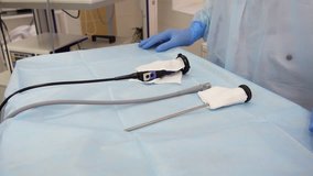 preparation of endoscopic equipment for diagnostic examination. Connecting an endoscopic tube with a light guide and a video camera