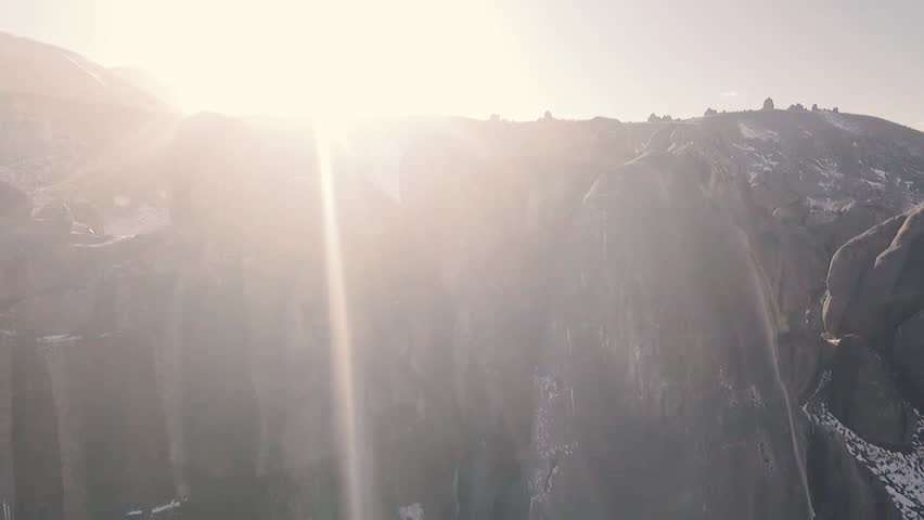 Beautiful scenic drone footage of Castle Hill, New Zealand. Snow fall, mountains, boulders, winter.