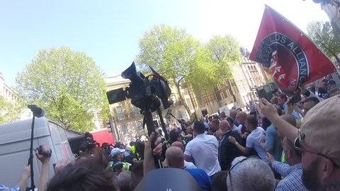 A fight breaks out between protesters and people attending the event during the Day For Freedom event held in Whitehall, London, England. 06/05/18