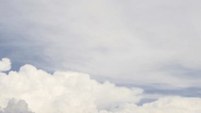 Sunny clouds, time lapse. A timelapse of generic clouds on a blue sky for background, nice exotic soft blue skies with white cloudscape rolling in horizone. ULTRA HD, 3840x2160, UHD.