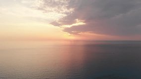 Sunset over the Ionian sea with fishing boat on Lefkada island Greece, summer background. Aerial, drone view