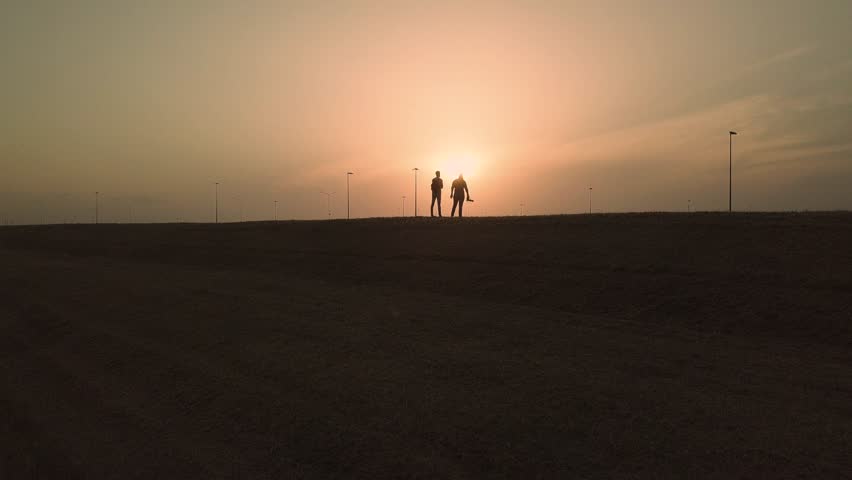 
Aerial view of an endless white car park, ready for delivery to the dealer out of a factory. 
Concept of car sharing, industrial production.