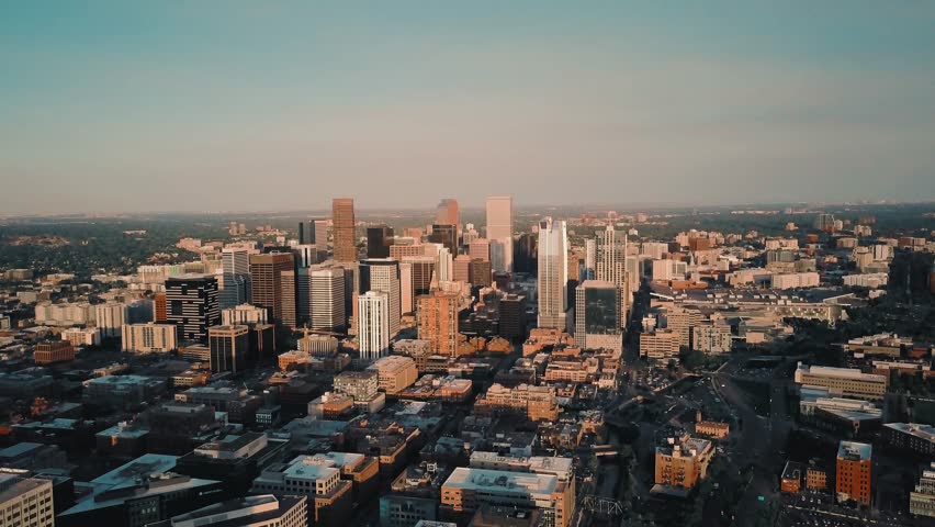 4k aerial drone footage - City of Denver Colorado skyline at sunset