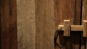 Old rustic teak wood plank door texture, old style lock video 4k