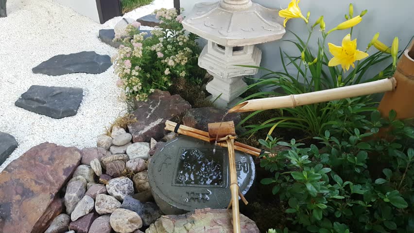 Small Water Dripping In Japanese Garden