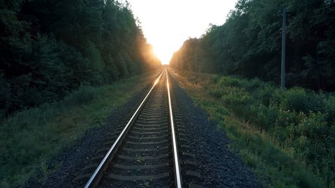 Railway Tracks at Sunset, Smooth Aerial Motion
