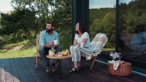 Lovely middle-aged couple having breakfast on the terrace. Comfort, morning routine, coffee time. Couple goals, family portrait. Love story - Powered by Shutterstock - Get 15% off with code: PIKWIZARD15
